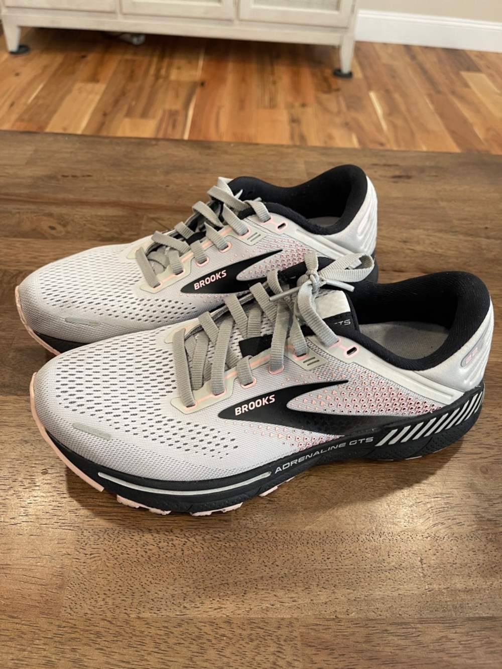 Brooks White Running Shoes with Black and Pink Accents